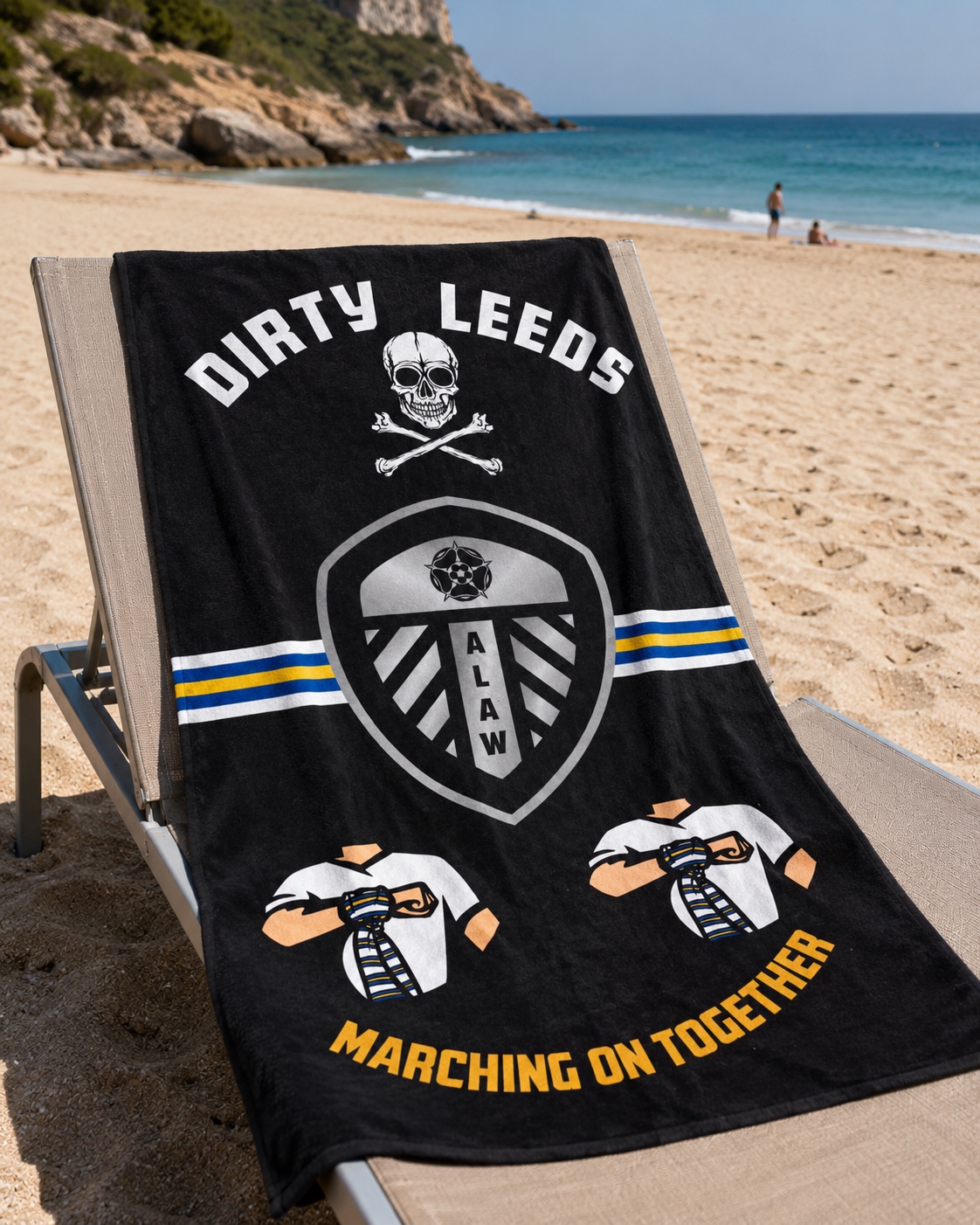 Dirty Leeds® ALAW MOT Black Beach Towel – shown on a sunbed.