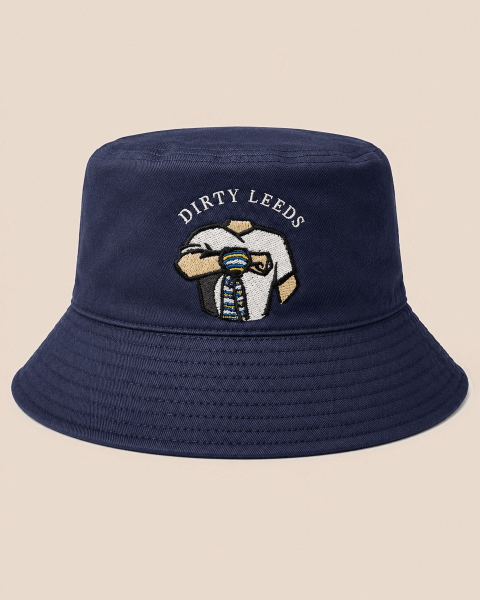 Front view of the Dirty Leeds® Navy Bucket Hat with white embroidered Dirty Leeds lettering and scarf salute graphic.